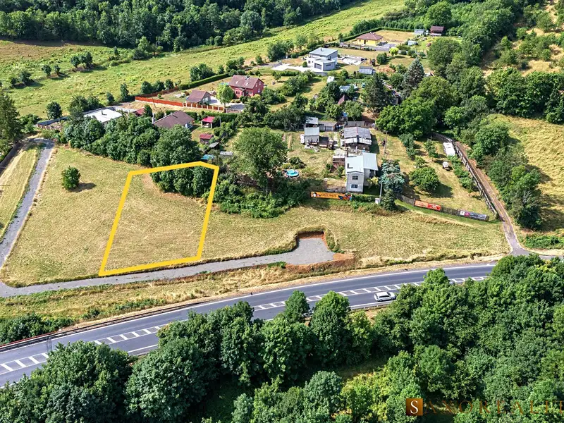 Prodej stavebního pozemku 1058 m², Bystřany – náhled fotky 1