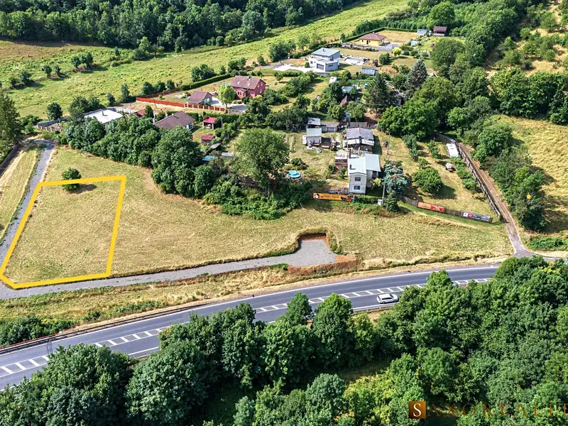 Prodej stavebního pozemku 1211 m², Bystřany – náhled fotky 1