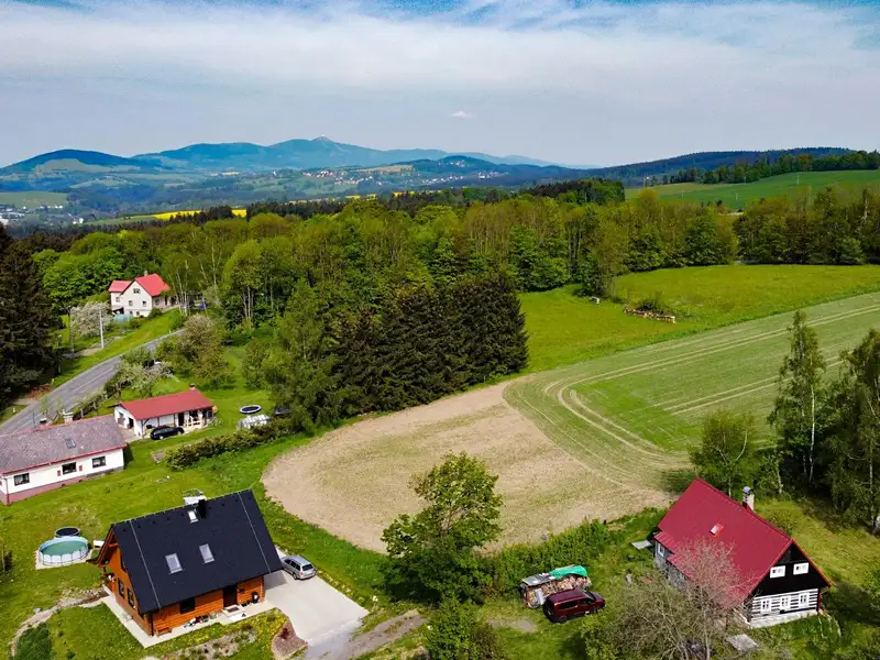Prodej stavebního pozemku 1453 m², Dalešice – náhled fotky 2