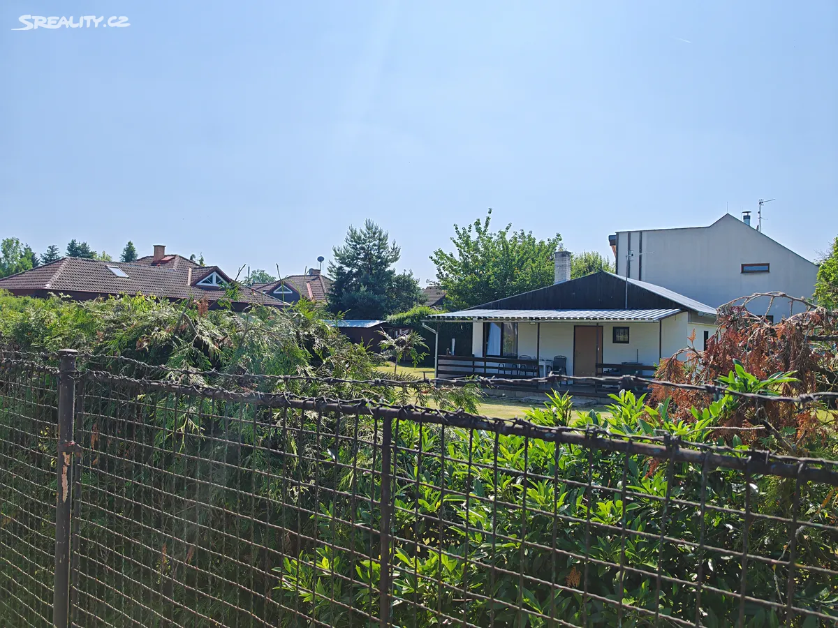 Prodej stavebního pozemku 1047 m² – pohled 4