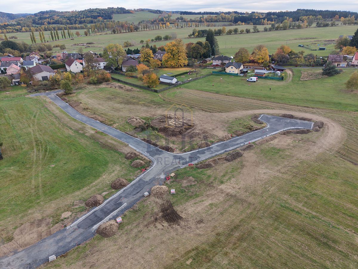 Prodej stavebního pozemku 1000 m² – fotografie 2