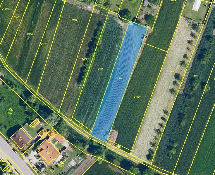 Prodej stavebního pozemku 1461 m², Břežany – náhled fotky 1