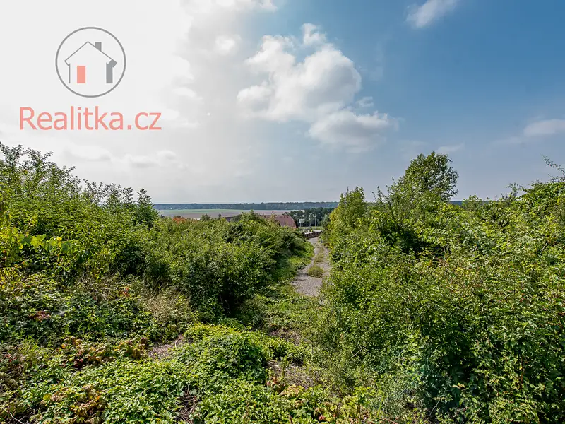 Prodej stavebního pozemku 7065 m², Kly – náhled fotky 3