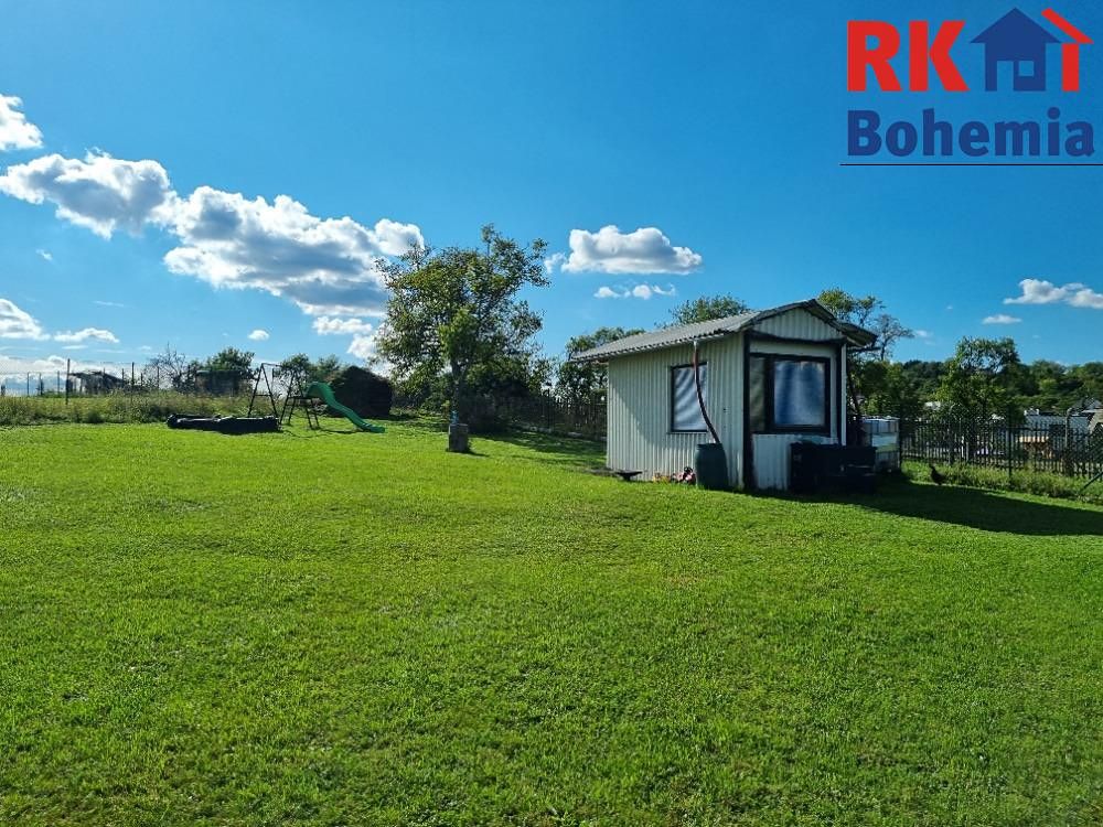 Prodej stavebního pozemku 1369 m², Dobrovice – fotka 1 z 3