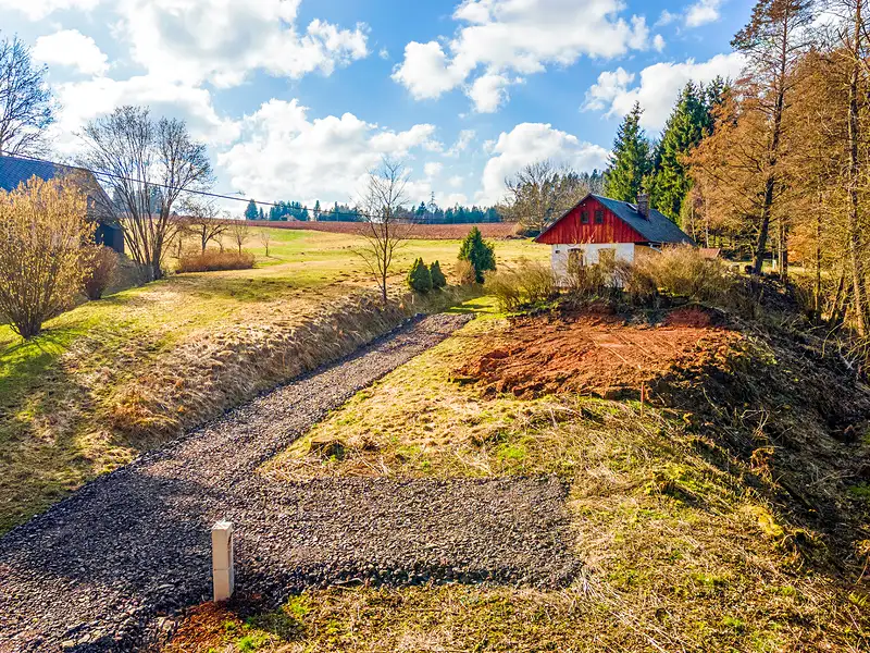 Prodej stavebního pozemku 703 m², Svojek – náhled fotky 1