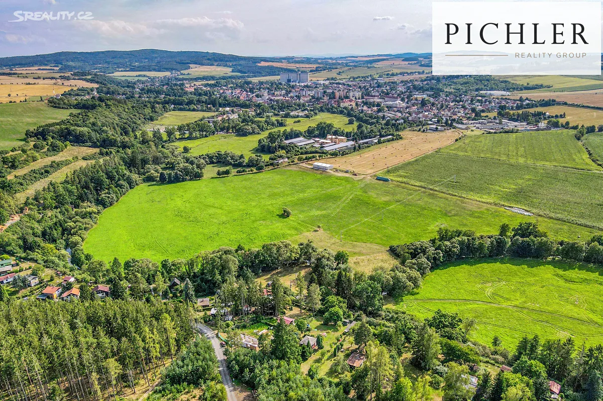 Prodej stavebního pozemku 1579 m² – pohled 2