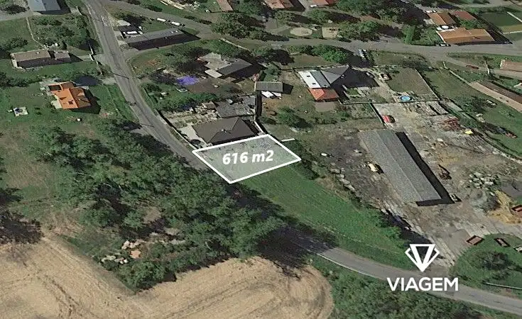 Prodej stavebního pozemku 616 m², Dobrovice – náhled fotky 1