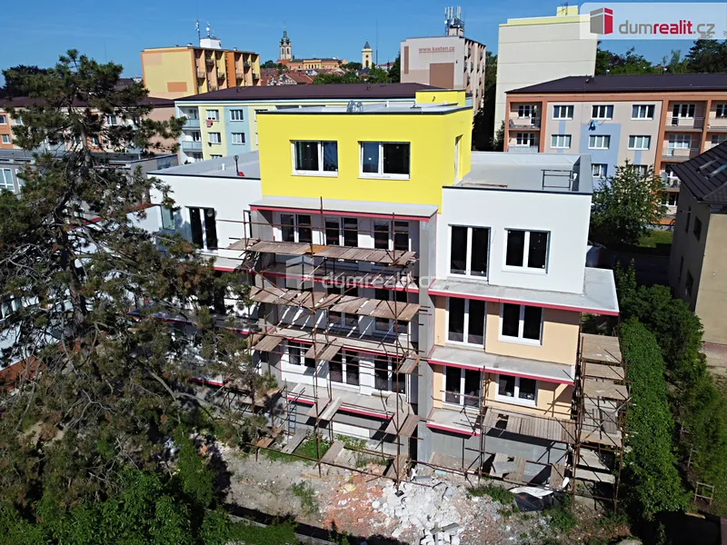 Byt 3+kk, 66 m2 s balkonem a parkovacím místem