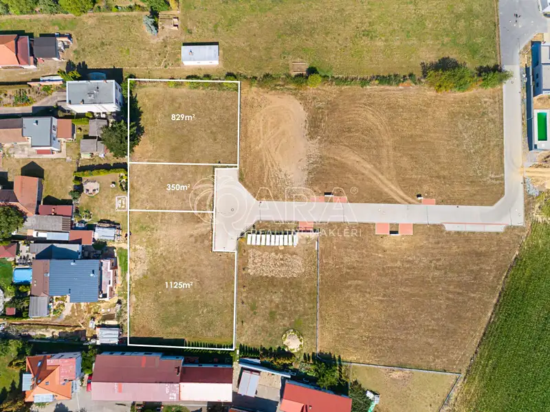 Prodej stavebního pozemku 2304 m², Vestec – náhled fotky 1