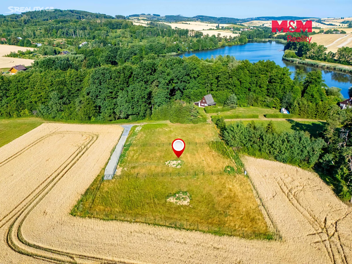 Prodej stavebního pozemku 1092 m² – pohled 2