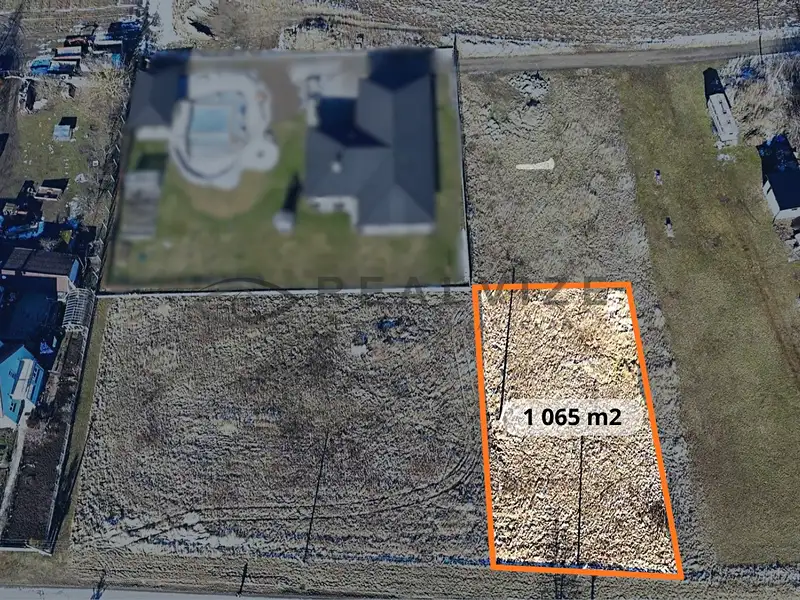 Prodej stavebního pozemku 1065 m², Lišov – náhled fotky 1