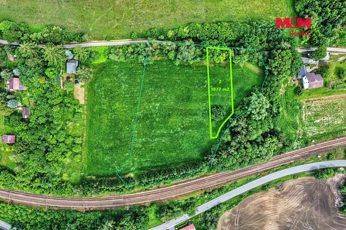 Prodej stavebního pozemku 1077 m² – fotografie 2