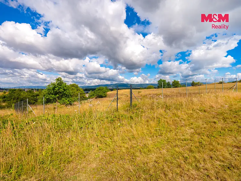 Prodej stavebního pozemku 1184 m², Hostomice – náhled fotky 3