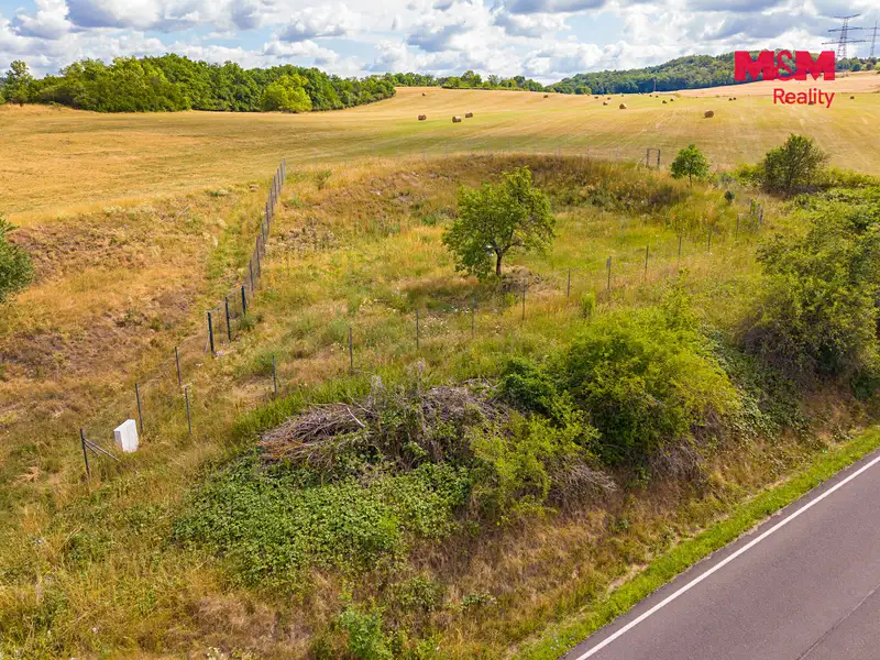 Prodej stavebního pozemku 1184 m², Hostomice – náhled fotky 2