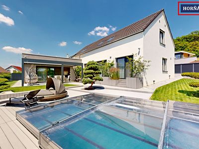 Prodej rodinného domu 288 m², pozemek 863 m²