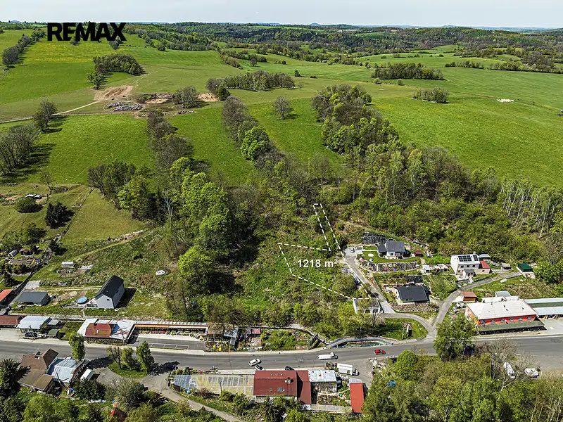 Prodej stavebního pozemku 1218 m², Petrovice – náhled fotky 1