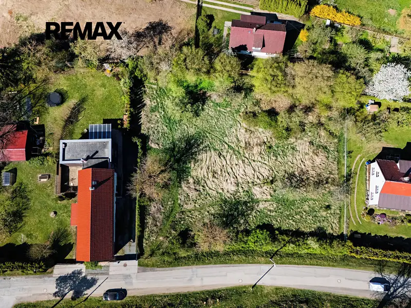 Prodej stavebního pozemku 1185 m², Hrusice – náhled fotky 2