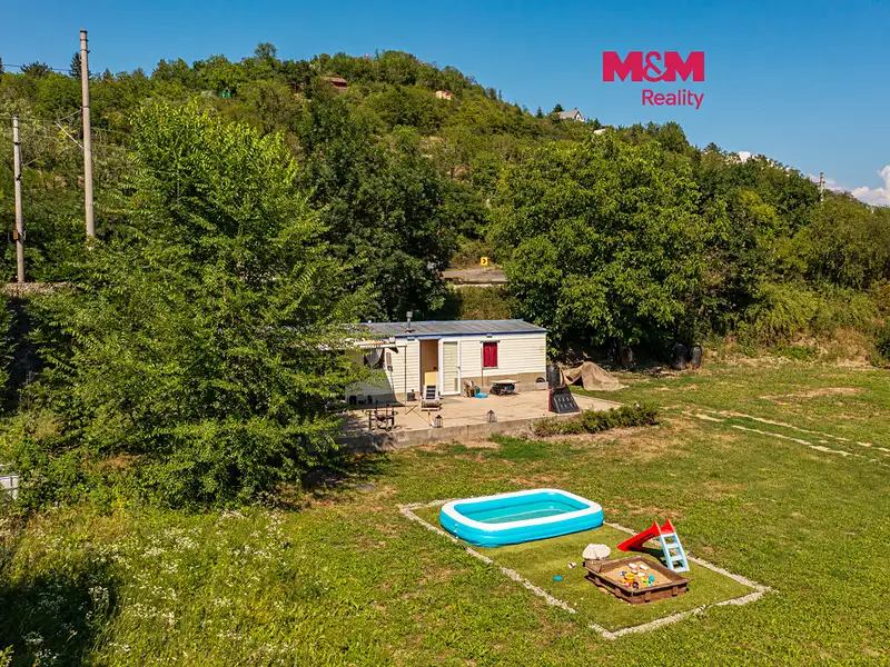 Prodej zahrady 612 m², Křešice – náhled fotky 1