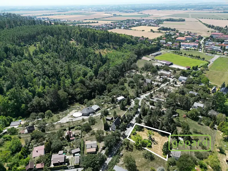 Prodej stavebního pozemku 900 m², Dolany – náhled fotky 1