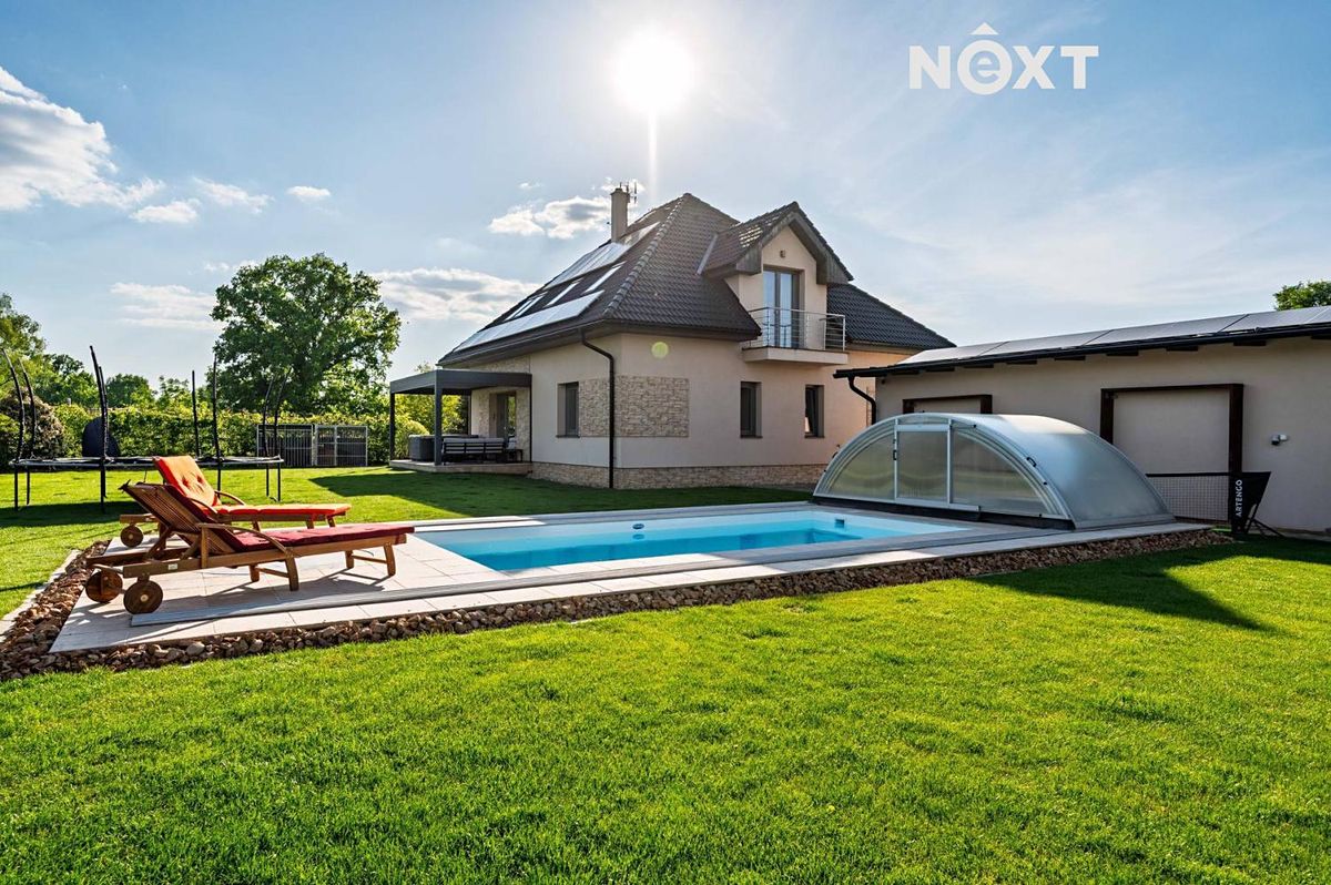 Prodej rodinného domu 188 m², pozemek 1936 m²
