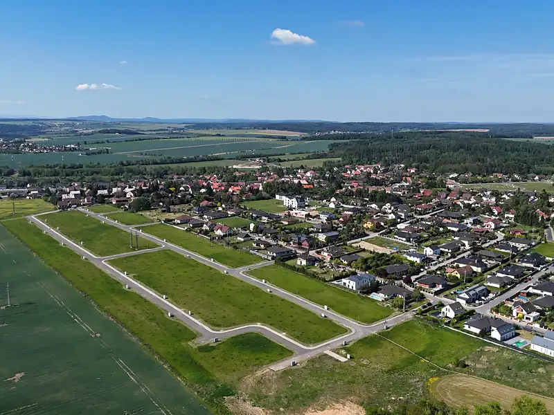 Prodej stavebního pozemku 950 m², Doksy – náhled fotky 1