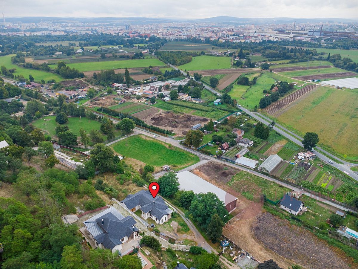 Prodej rodinného domu 209 m², pozemek 1020 m² – fotografie 5