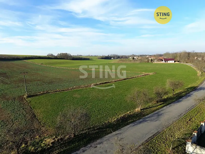 Prodej stavebního pozemku 1167 m², Lozice – náhled fotky 1