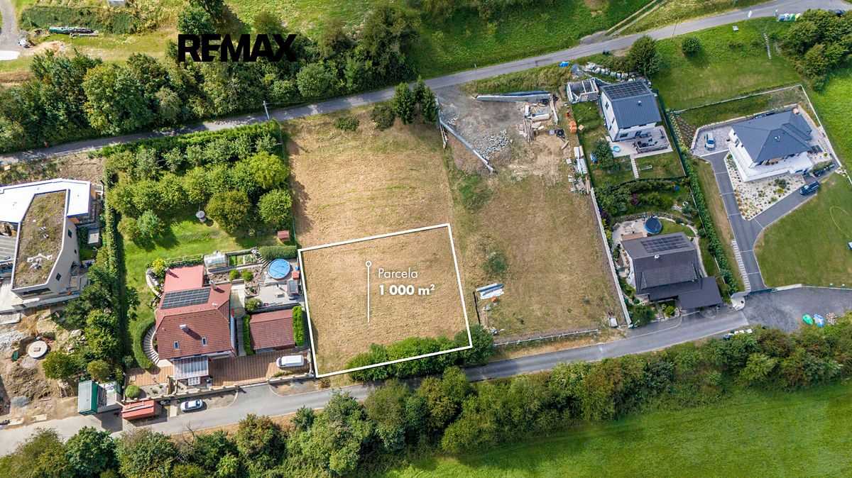 Prodej stavebního pozemku 1000 m² – fotografie 3
