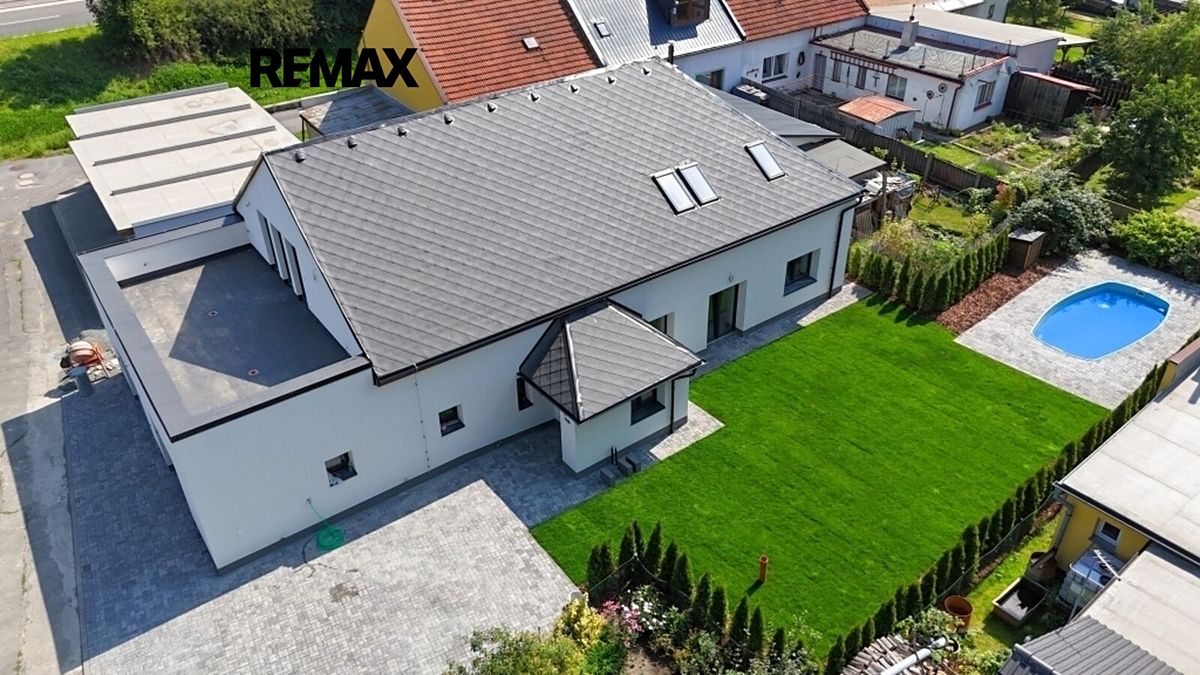 Prodej rodinného domu 321 m², pozemek 558 m² – fotografie 4