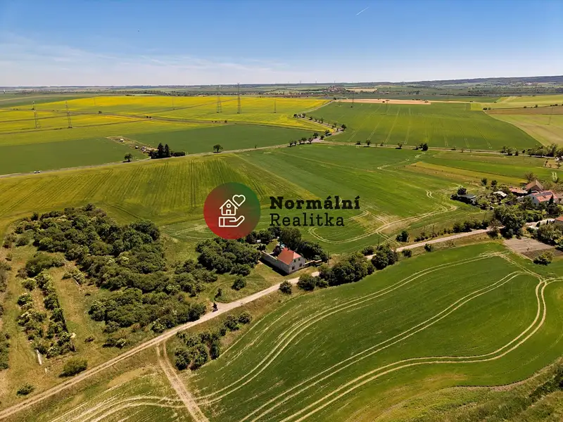 Prodej stavebního pozemku 1796 m², Postoloprty – náhled fotky 2