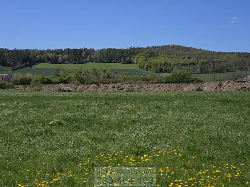 Prodej stavebního pozemku 1000 m², Krnov – náhled fotky 1