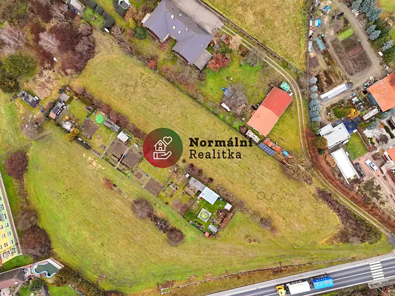 Prodej stavebního pozemku 3063 m², Byšice – náhled fotky 1