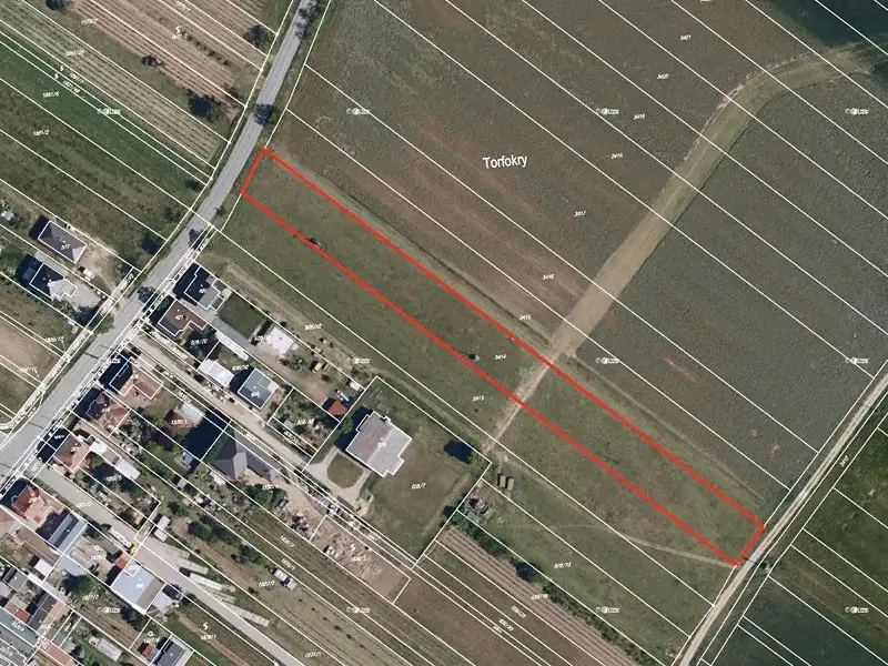 Prodej stavebního pozemku 1700 m², Ivaň – náhled fotky 1
