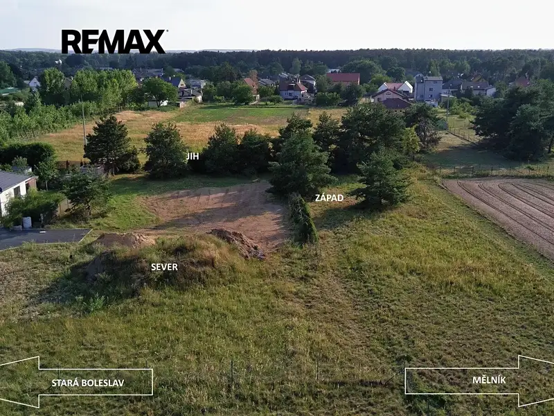 Prodej stavebního pozemku 1087 m², Tišice – náhled fotky 1