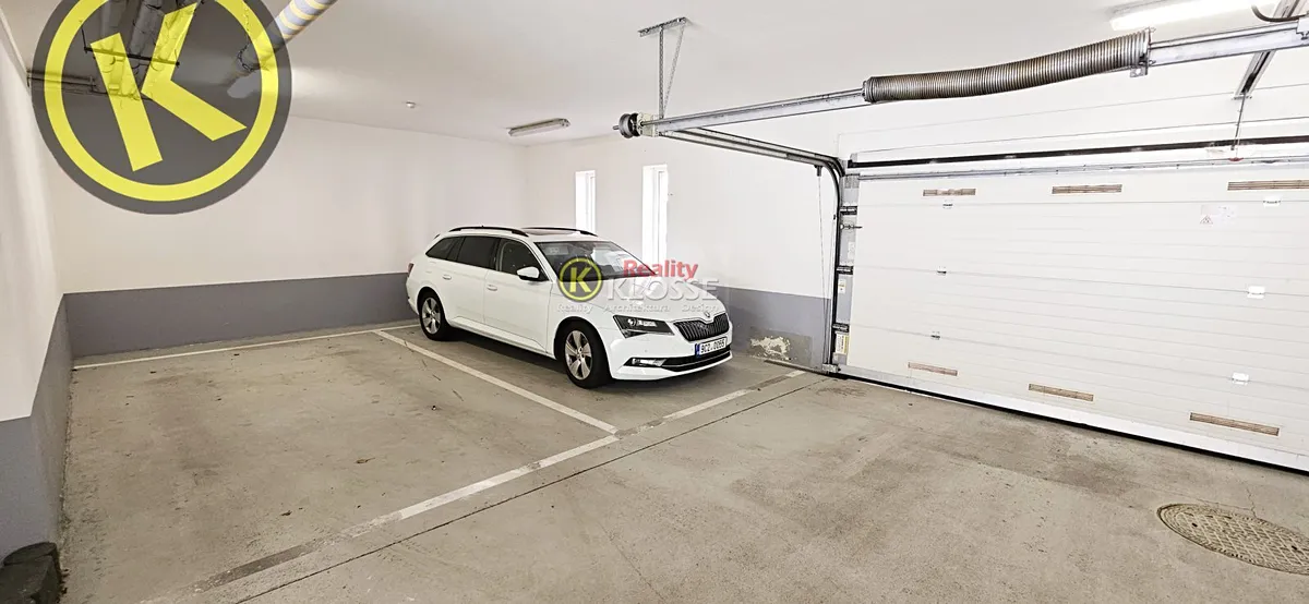 Pronájem garážového stání 15 m²
