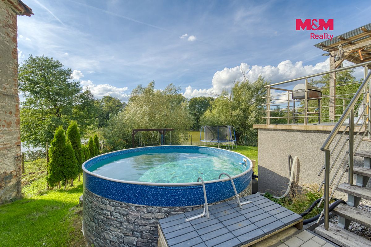 Prodej rodinného domu 144 m², pozemek 925 m² – fotografie 4