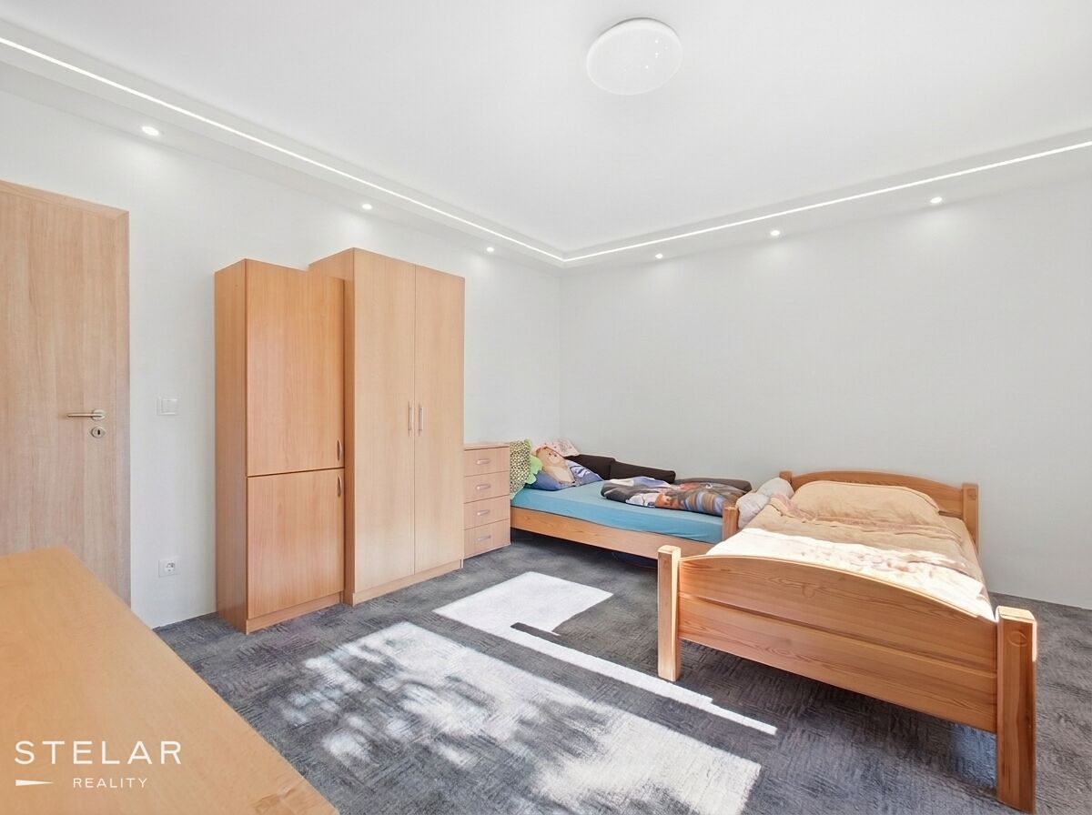 Prodej rodinného domu 228 m², pozemek 395 m² – fotografie 5