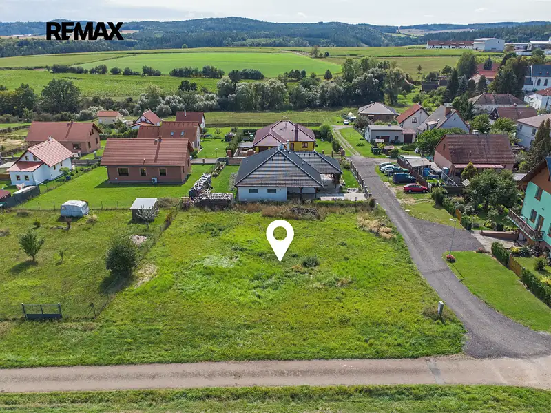 Prodej stavebního pozemku 983 m², Mlečice – náhled fotky 1
