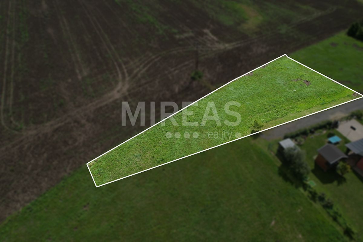Prodej stavebního pozemku 1149 m², Ledce – fotka 1 z 3