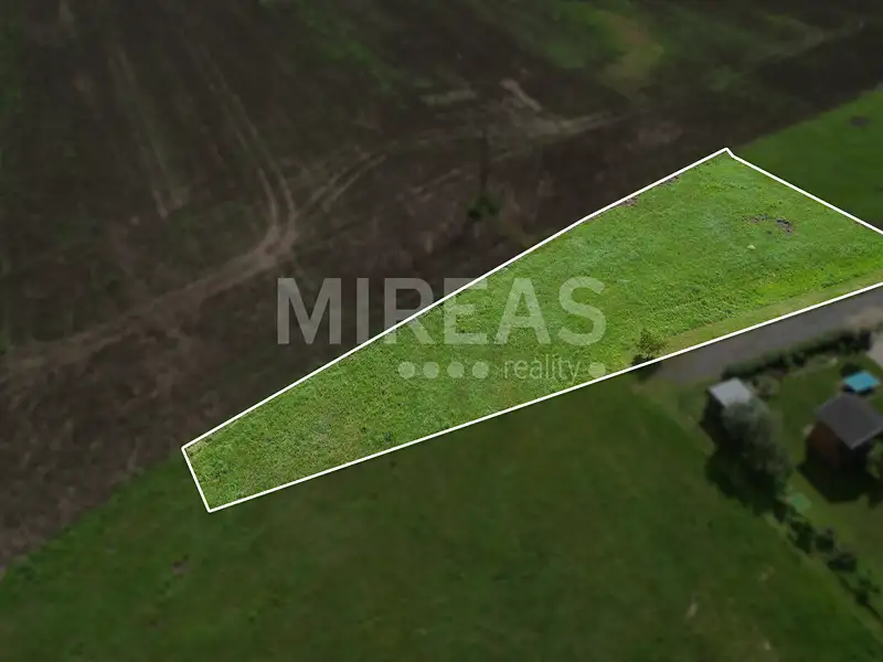 Prodej stavebního pozemku 1149 m², Ledce – náhled fotky 1