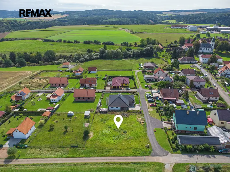 Prodej stavebního pozemku 983 m², Mlečice – náhled fotky 2