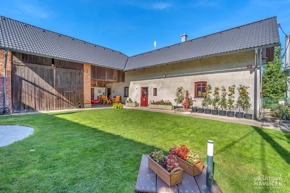 Prodej rodinného domu 211 m², pozemek 394 m² – fotografie 4