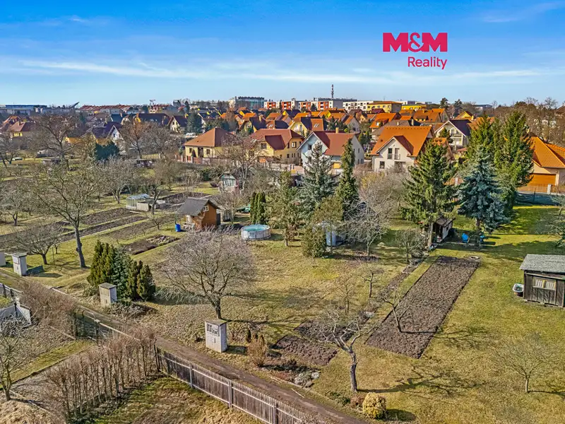 Prodej stavebního pozemku 1053 m², Louny – náhled fotky 1