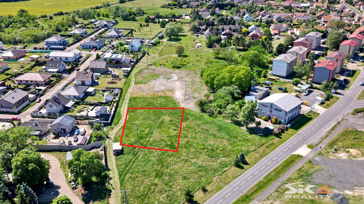 Prodej stavebního pozemku 1201 m², Dobroměřice – fotka 1 z 3