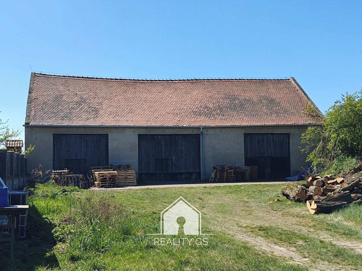 Prodej stavebního pozemku 1419 m², Postoloprty – fotka 1 z 3
