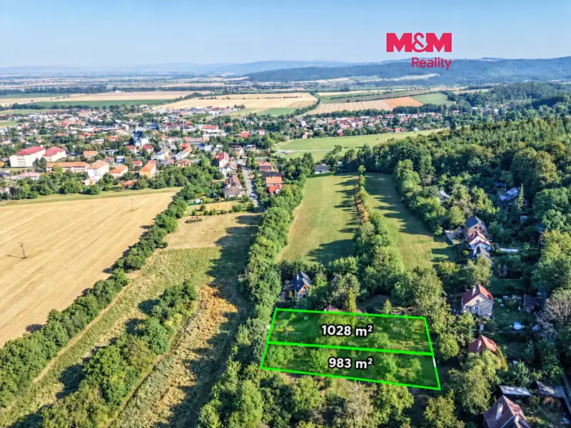 Prodej stavebního pozemku 1098 m², Dolany – náhled fotky 1
