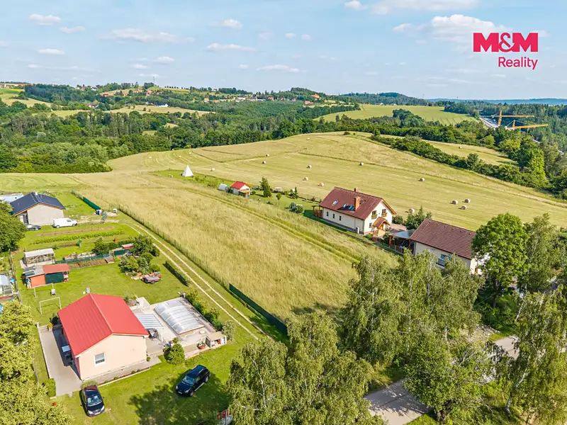 Prodej stavebního pozemku 1100 m², Hrusice – náhled fotky 3
