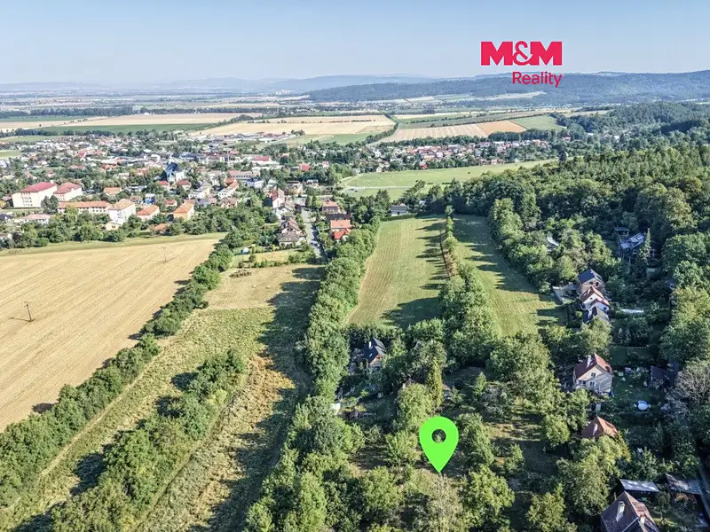 Prodej stavebního pozemku 983 m², Dolany – náhled fotky 1