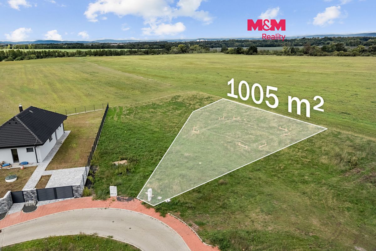 Prodej stavebního pozemku 1005 m², Postoloprty – fotka 1 z 3