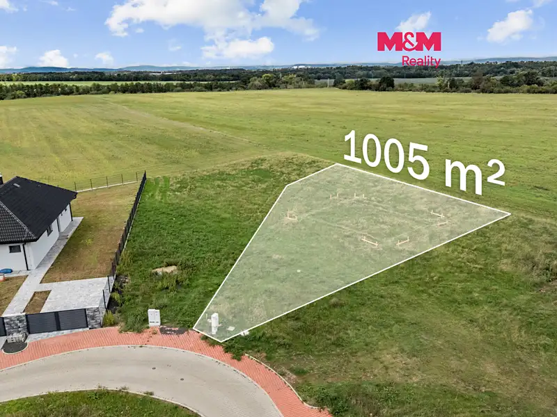 Prodej stavebního pozemku 1005 m², Postoloprty – náhled fotky 1